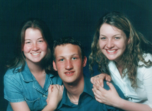 Thomas with his sisters, Nicole and Melissa