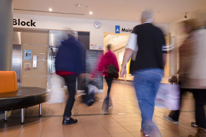 Blurry people main hospital entrance